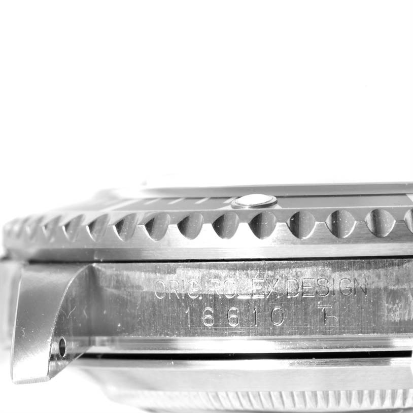 This image shows a close-up side view of a Rolex Submariner 16610 Men
s Stainless Steel Black Dial 16610 Men
s Stainless Steel Black Dial watch, focusing on the bezel and case with the model number engraved.