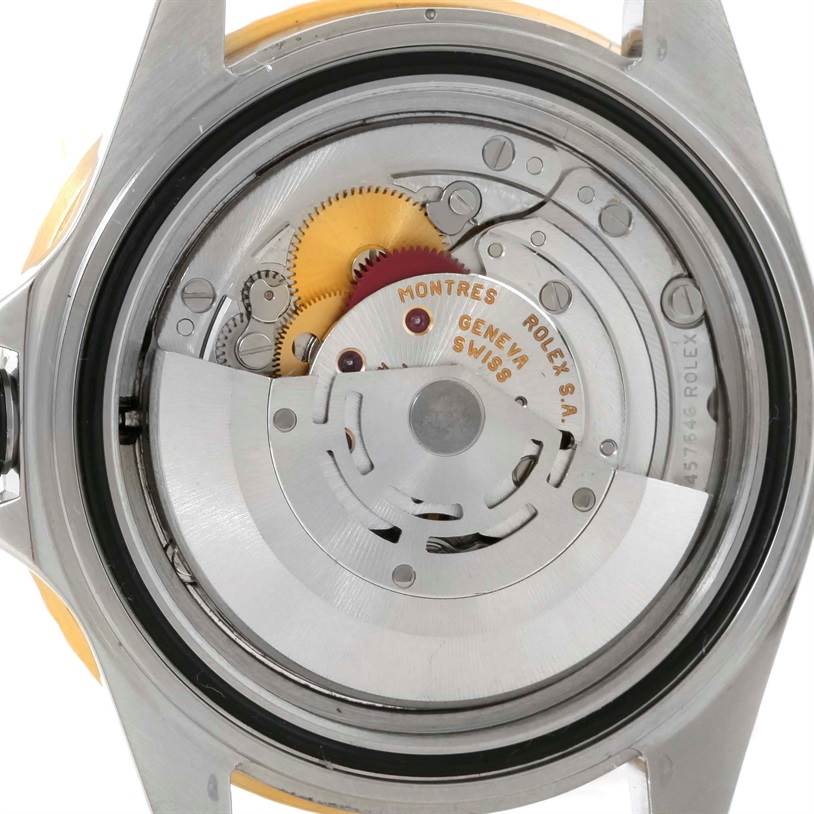 This image shows the inner mechanical movement of a Rolex Submariner 16613 Men's Steel and Gold (two tone) Black Dial 16613 Men's Steel and Gold (two tone) Black Dial watch from a back view angle.