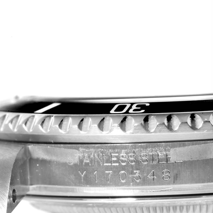 This image shows a close-up side view of the bezel and case with the serial number of a Rolex Submariner 16610 Men
s Stainless Steel Black Dial 16610 Men
s Stainless Steel Black Dial watch.