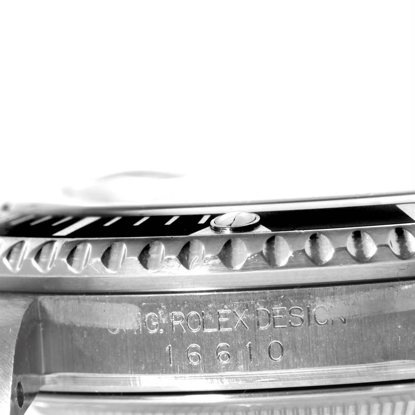 The image shows a close-up side view of the bezel and case of a Rolex Submariner 16610 Men
s Stainless Steel Black Dial 16610 Men
s Stainless Steel Black Dial watch, highlighting the model number 16610.