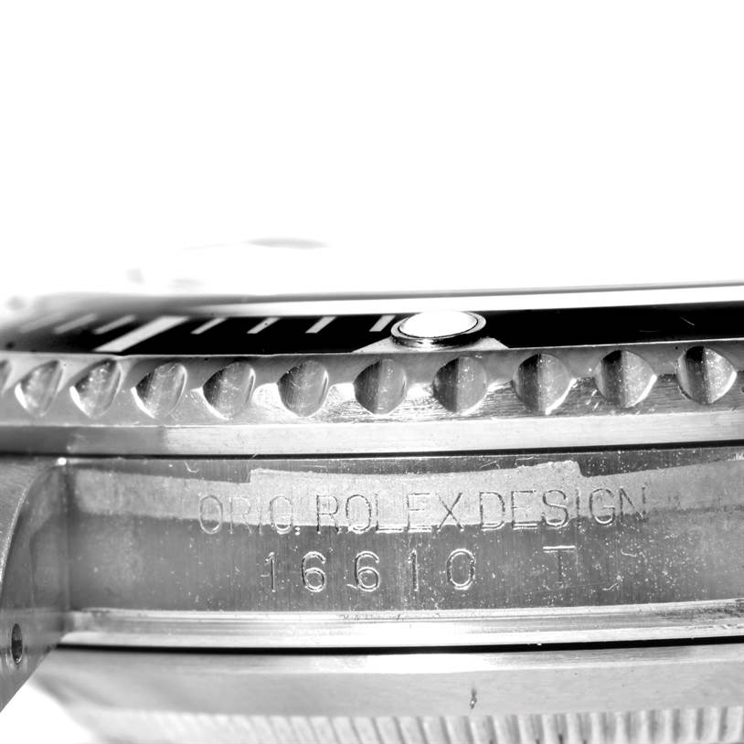 The image shows a close-up of the side profile and bezel details of a Rolex Submariner 16610 Men
s Stainless Steel Black Dial 16610 Men
s Stainless Steel Black Dial watch, including the model engraving.