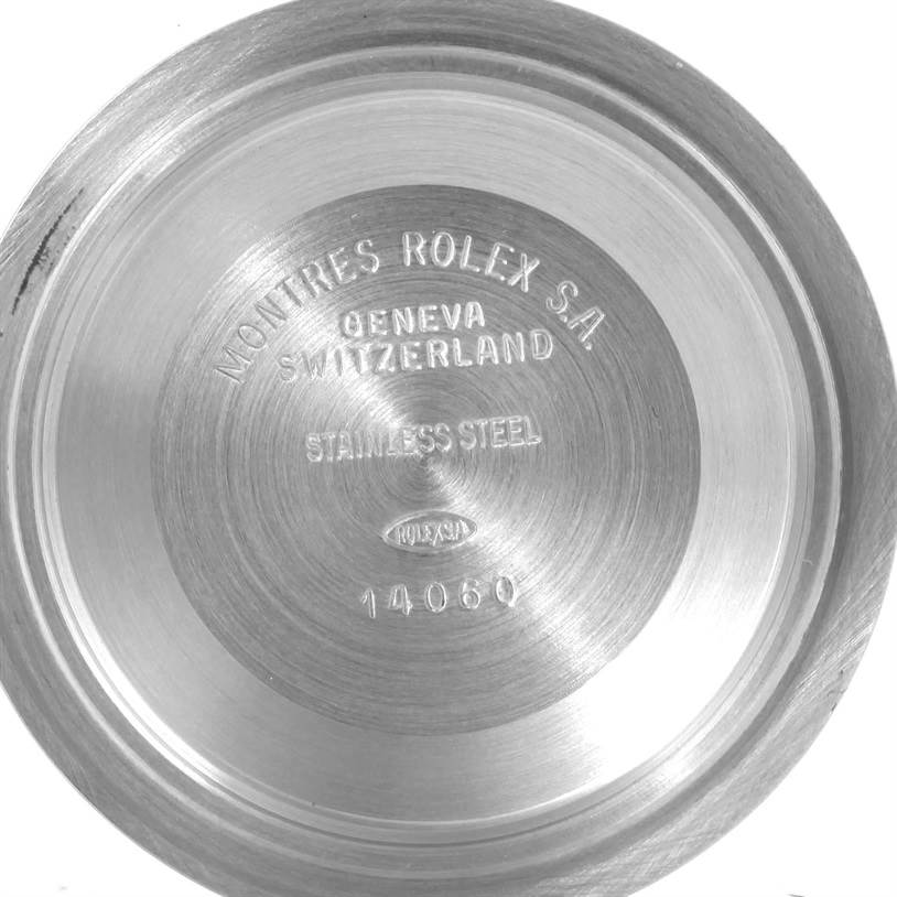 The image shows the inside case back of a Rolex Submariner 14060 Men
s Stainless Steel Black Dial 14060 Men
s Stainless Steel Black Dial watch, model 14060, made of stainless steel.