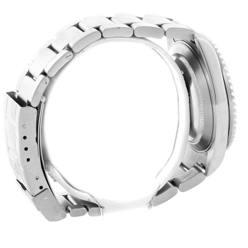 This is a side view of the band, clasp, and case of a Rolex Submariner 16610 Men
s Stainless Steel Black Dial 16610 Men
s Stainless Steel Black Dial watch.