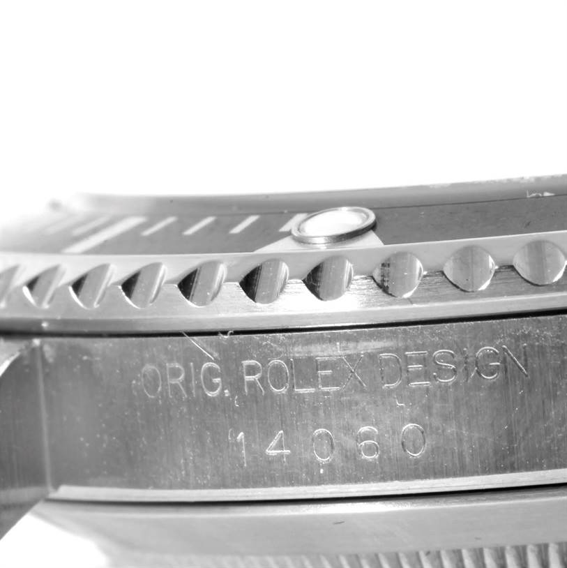 The image shows a close-up side view of the bezel and case of a Rolex Submariner 14060 Men
s Black Dial 14060 Men
s Black Dial watch, displaying the model number 14060.