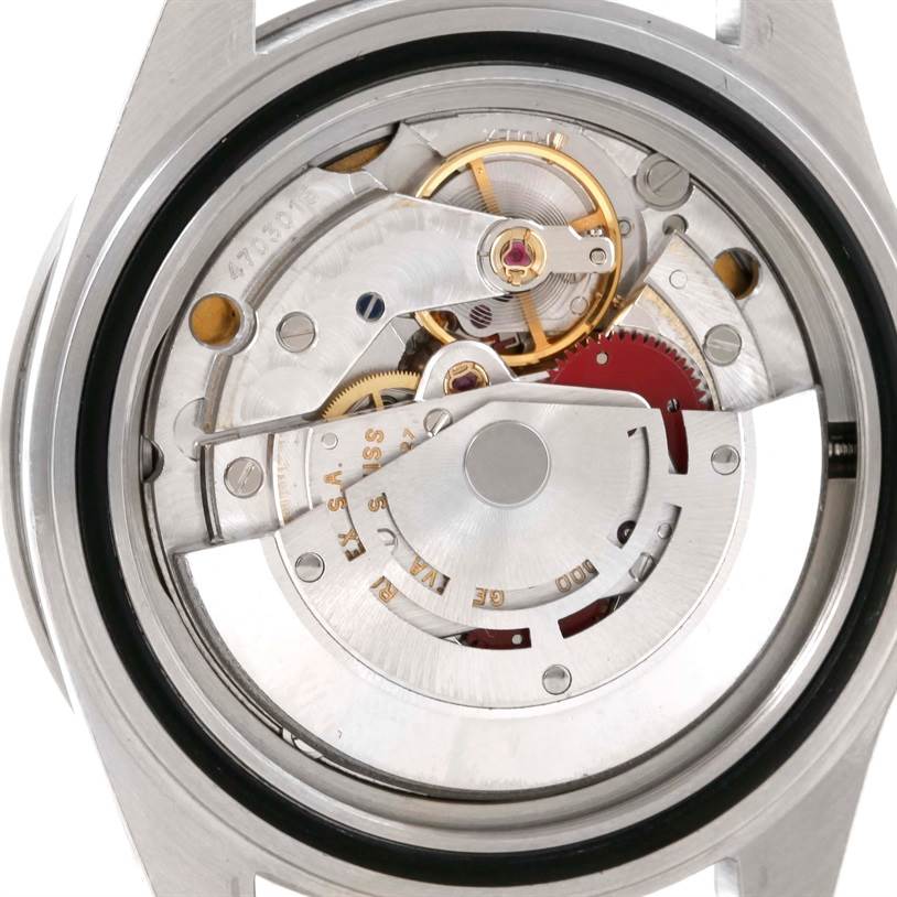 This image shows a close-up view of the movement and internal mechanics of a Rolex Submariner 14060 Men
s Black Dial 14060 Men
s Black Dial model watch.