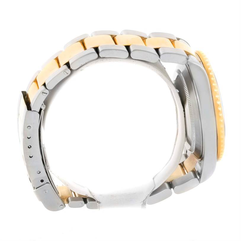 This image shows a side view of a two-tone Rolex Submariner 16613 Men
s Steel and Gold (two tone) Blue Dial 16613 Men
s Steel and Gold (two tone) Blue Dial watch, highlighting its bracelet and case profile.