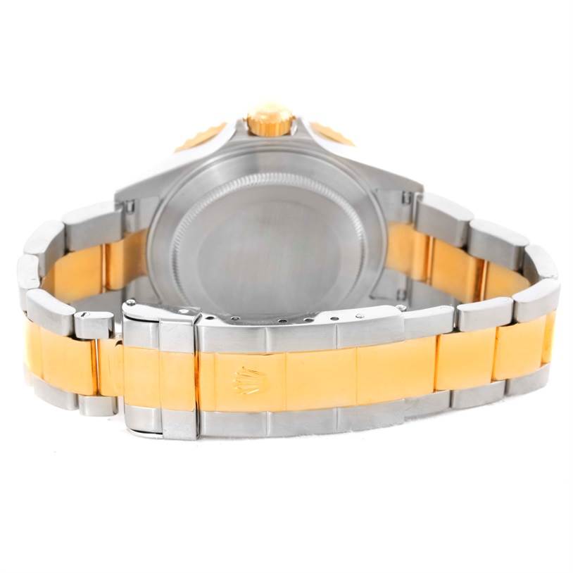 This image shows the back and clasp of a Rolex Submariner 16613 Men
s Steel and Gold (two tone) Blue Dial 16613 Men
s Steel and Gold (two tone) Blue Dial watch, highlighting its two-tone band.