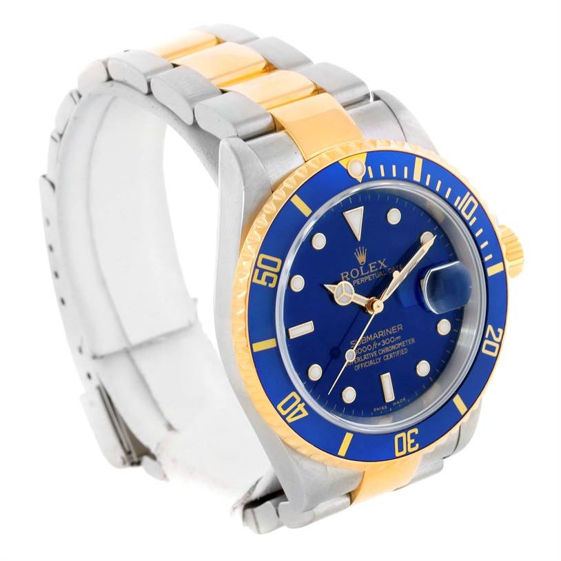 The Rolex Submariner 16613 Men
s Steel and Gold (two tone) Blue Dial 16613 Men
s Steel and Gold (two tone) Blue Dial watch is shown at a left-side angle, highlighting its blue and gold bezel, dial, and stainless steel and gold band.