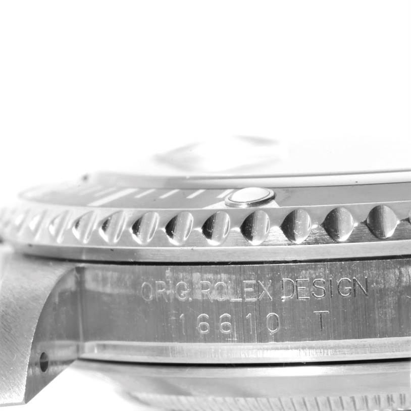 The image shows a close-up side view of the bezel and case of a Rolex Submariner 16610 Men's Stainless Steel Black Dial 16610 Men's Stainless Steel Black Dial watch, along with part of the model number.