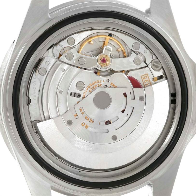 This image shows the back view and internal mechanism of a Rolex Submariner 16610 Men's Stainless Steel Black Dial 16610 Men's Stainless Steel Black Dial watch.