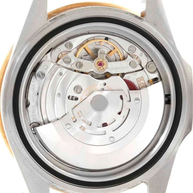 This image shows the detailed internal movement mechanism of a Rolex Submariner 16613 Men
s Steel and Gold (two tone) Blue Dial 16613 Men
s Steel and Gold (two tone) Blue Dial watch.