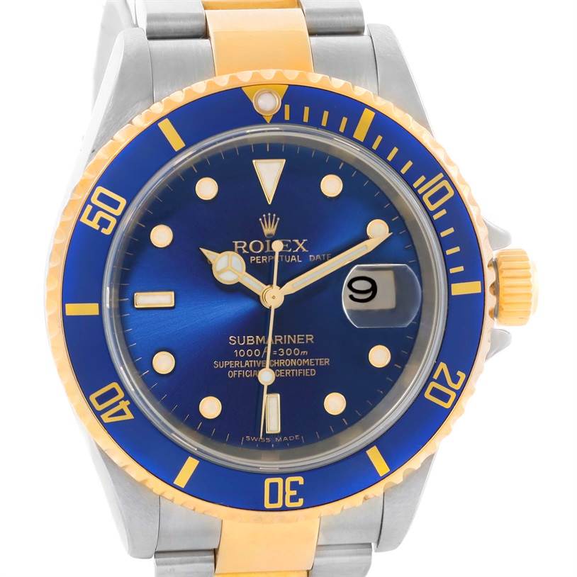 The image shows a front view of the Rolex Submariner 16613 Men
s Steel and Gold (two tone) Blue Dial 16613 Men
s Steel and Gold (two tone) Blue Dial watch, highlighting its blue bezel, dial, and two-tone bracelet.