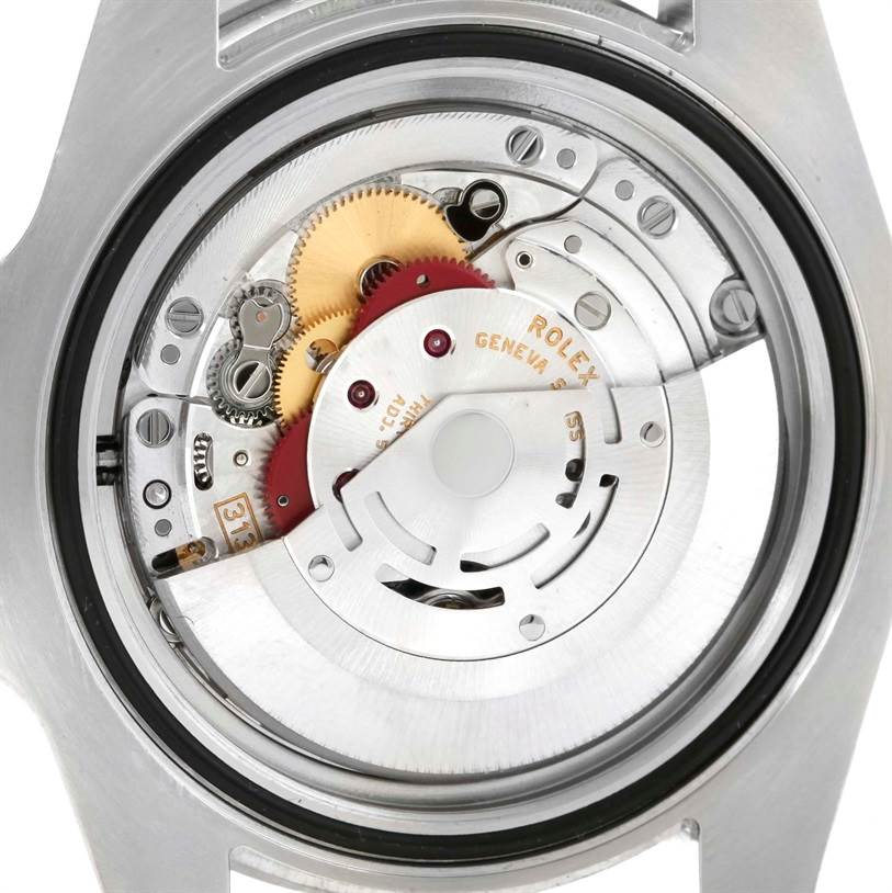 This image shows the internal movement mechanism of a Rolex Submariner 116610 Men
s Stainless Steel Black Dial 116610 Men
s Stainless Steel Black Dial watch from the back, highlighting gears and the rotor.