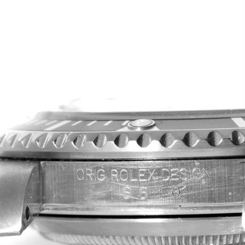 The image shows a side close-up of the Rolex Submariner 16610 Men
s Stainless Steel Black Dial 16610 Men
s Stainless Steel Black Dial case and bezel, with "ORIG ROLEX DESIGN" engraved on the side.