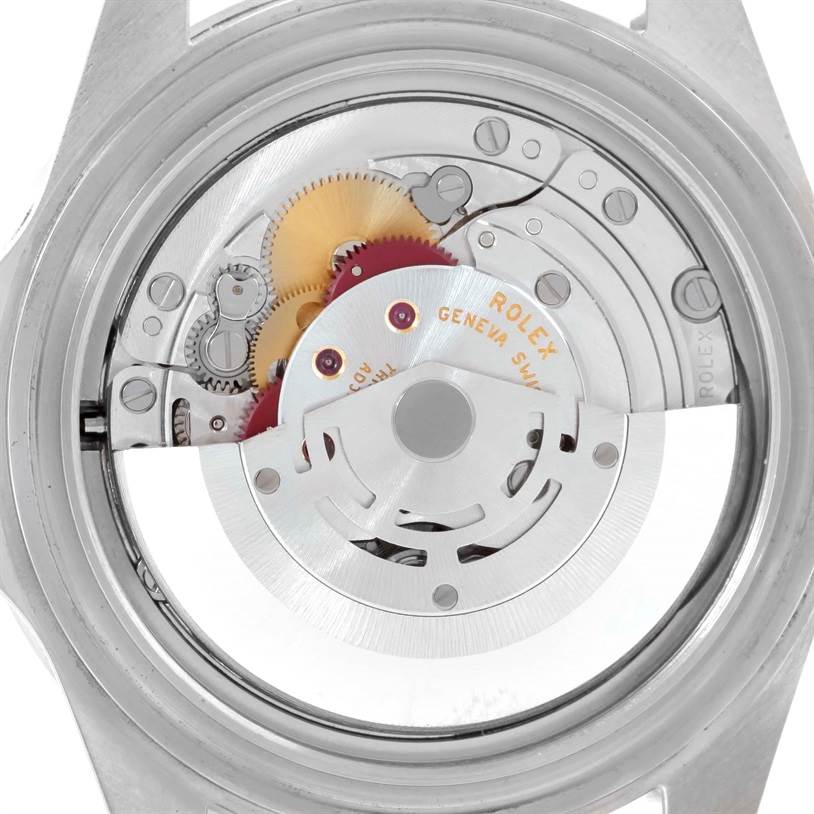 This is an image of the back side mechanism of a Rolex Submariner 14060 Men
s Stainless Steel Black Dial 14060 Men
s Stainless Steel Black Dial watch, showing its intricate gears and inner workings.