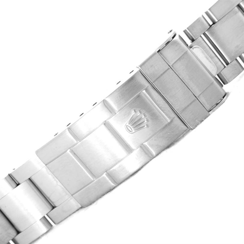 The image shows the stainless steel clasp and part of the bracelet of a Rolex Submariner 16610LV Men
s Stainless Steel Black Dial 16610LV Men
s Stainless Steel Black Dial watch.