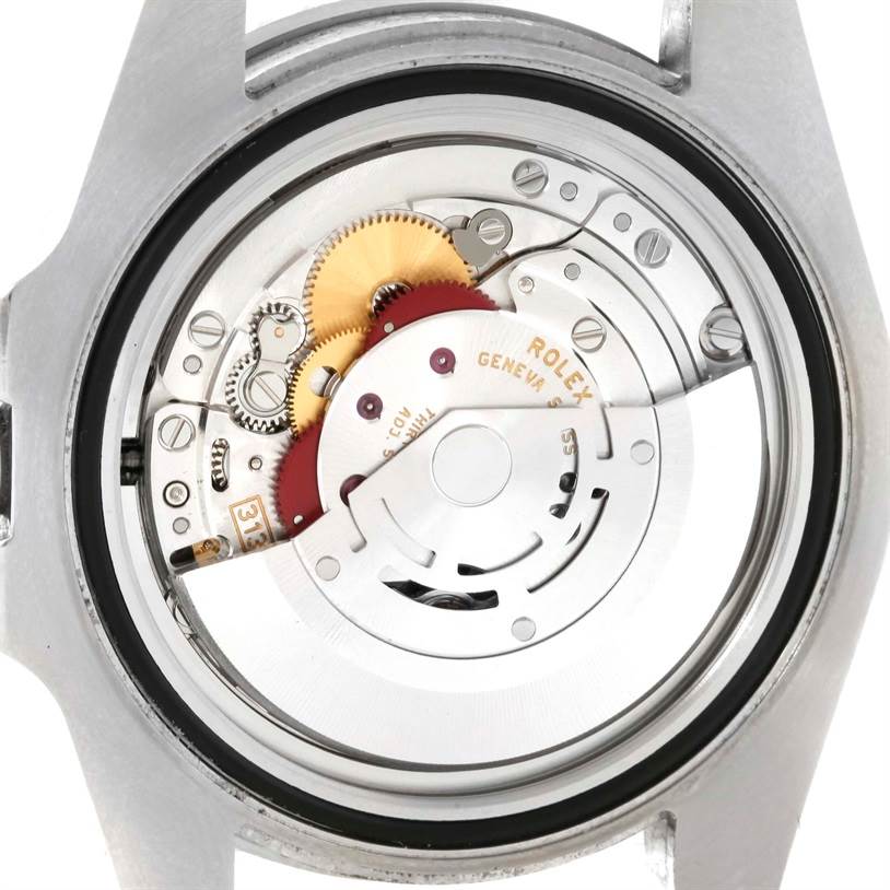 This image shows the back view of a Rolex Submariner 116610LV Men's Stainless Steel Green Dial 116610LV Men's Stainless Steel Green Dial, revealing its intricate automatic movement.