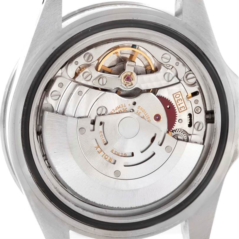 This is the back view of the Rolex Submariner 14060 Men
s Stainless Steel Black Dial 14060 Men
s Stainless Steel Black Dial showcasing its intricate mechanical movement.