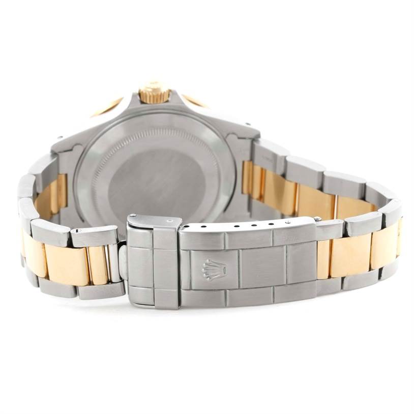 The image shows the back and bracelet clasp of a Rolex Submariner 16613 Men
s Steel and Gold (two tone) Blue Dial 16613 Men
s Steel and Gold (two tone) Blue Dial, with a two-tone design featuring both stainless steel and gold.