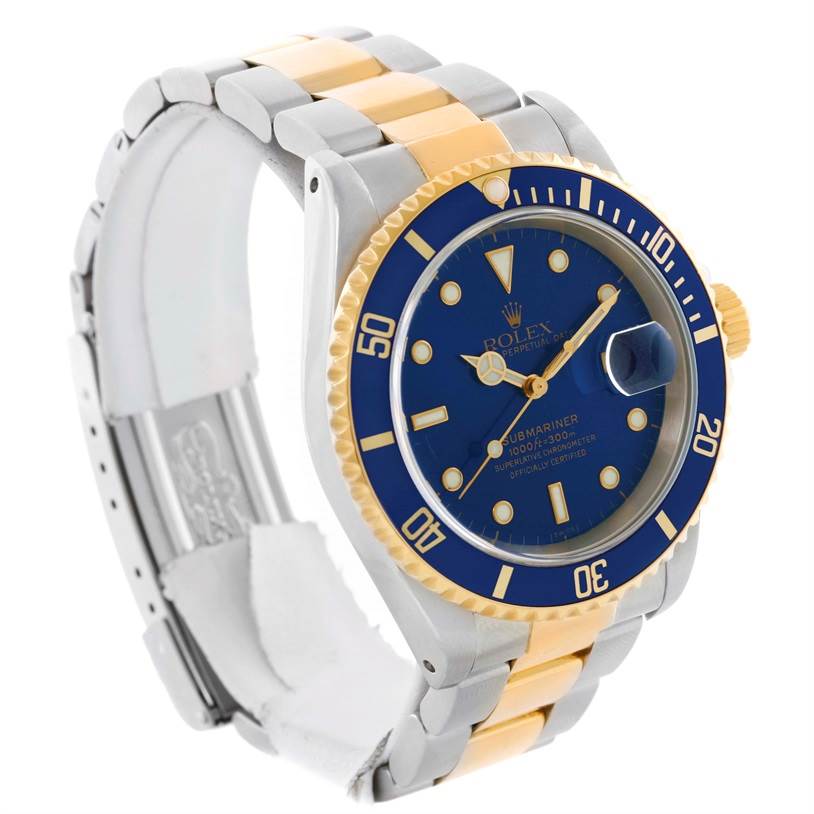 This image shows a side angle of a Rolex Submariner 16613 Men
s Steel and Gold (two tone) Blue Dial 16613 Men
s Steel and Gold (two tone) Blue Dial watch, featuring its blue dial, bezel, and two-tone bracelet.