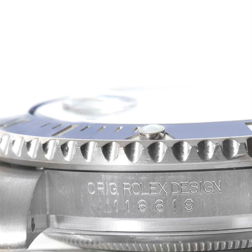 The image shows a close-up side angle of the Rolex Submariner 116619LB Men's White Gold Blue Dial 116619LB Men's White Gold Blue Dial watch, focusing on the bezel and engravings on the case.