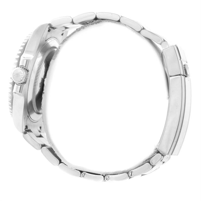 The image shows a side view of the Rolex Submariner 116619LB Men's White Gold Blue Dial 116619LB Men's White Gold Blue Dial watch featuring its crown, case, and metal bracelet clasp.