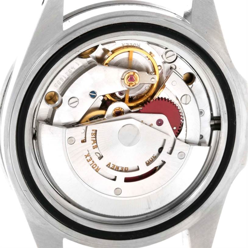 This image shows the inner mechanical movement of a Rolex Submariner 14060 Men
s Stainless Steel Black Dial 14060 Men
s Stainless Steel Black Dial watch from the back angle.