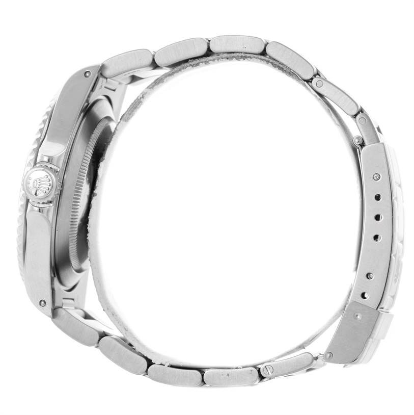 This image shows a side view of the Rolex Submariner 14060 Men
s Stainless Steel Black Dial 14060 Men
s Stainless Steel Black Dial watch, focusing on the case, crown, and metal bracelet.