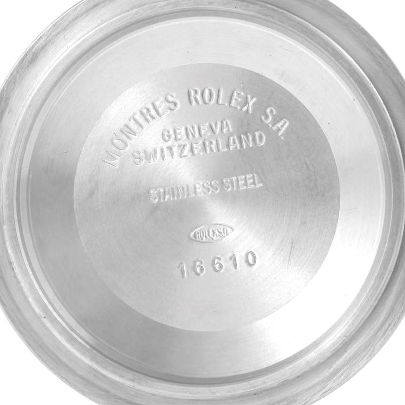 The image shows the case back of a Rolex Submariner 16613 Men
s Steel and Gold (two tone) Black Dial 16613 Men
s Steel and Gold (two tone) Black Dial watch model, displaying the interior engraving.