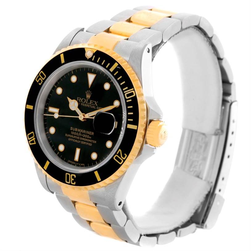The image shows a Rolex Submariner 16613 Men
s Steel and Gold (two tone) Black Dial 16613 Men
s Steel and Gold (two tone) Black Dial watch at a slight front-side angle, displaying the face, bezel, crown, and bracelet.