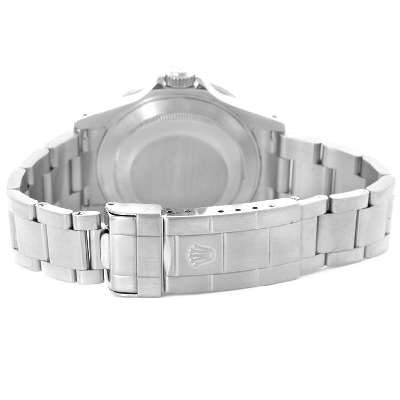 This image shows the back view of a Rolex Submariner 16610 Men
s Stainless Steel Black Dial 16610 Men
s Stainless Steel Black Dial watch, focusing on the case back and metal bracelet with the clasp.