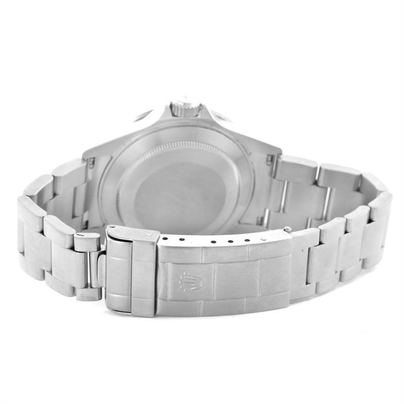 This image shows the back view of a Rolex Submariner 16610 Men
s Stainless Steel Black Dial 16610 Men
s Stainless Steel Black Dial watch, highlighting its clasp, bracelet, and case back.