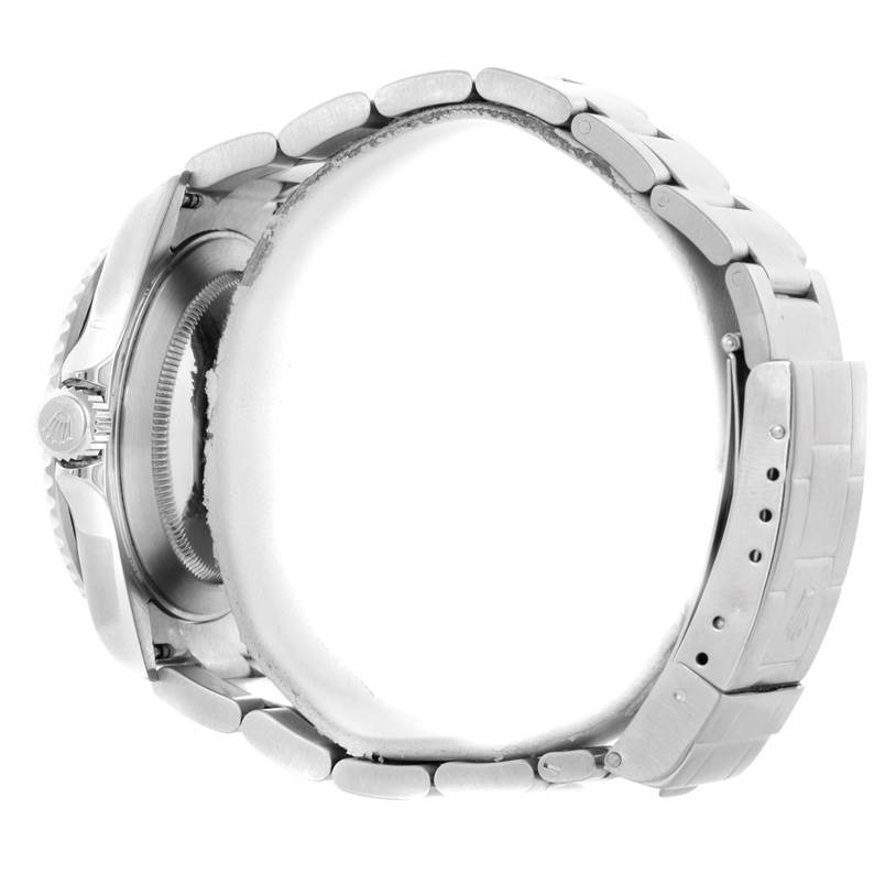 This image shows a side view of a Rolex Submariner 16610 Men
s Stainless Steel Black Dial 16610 Men
s Stainless Steel Black Dial watch, highlighting its crown, case, and bracelet.