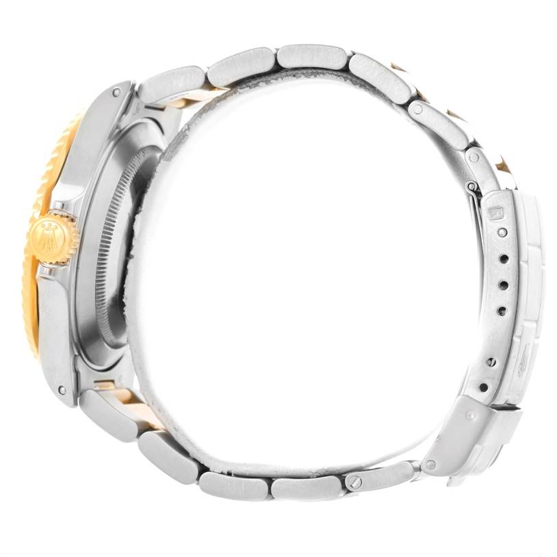 This image shows the side view and strap of a Rolex Submariner 16613 Men's Steel and Gold (two tone) Black Dial 16613 Men's Steel and Gold (two tone) Black Dial watch, highlighting the crown and clasp.