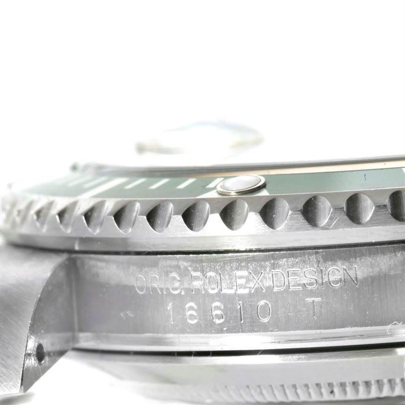 The image shows a close-up, side-angle view of the bezel and case side of a Rolex Submariner 16610LV Men
s Stainless Steel Black Dial 16610LV Men
s Stainless Steel Black Dial watch, model 16610.