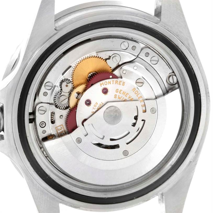 This image shows the internal mechanical movement of a Rolex Submariner 16610 Men
s Stainless Steel Black Dial 16610 Men
s Stainless Steel Black Dial watch viewed from the back.