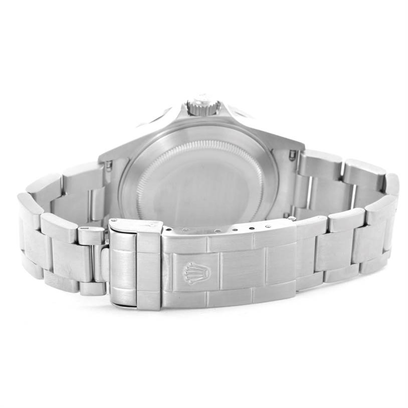 The image shows the stainless steel back and bracelet clasp of a Rolex Submariner 16610 Men
s Stainless Steel Black Dial 16610 Men
s Stainless Steel Black Dial watch from a rear angle.