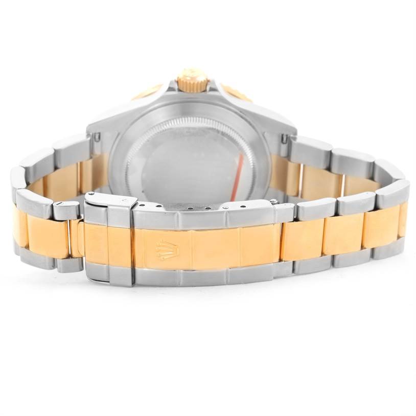 This image shows a rear view of a Rolex Submariner 16613 Men's Steel and Gold (two tone) Blue Dial 16613 Men's Steel and Gold (two tone) Blue Dial watch, highlighting its two-tone bracelet and clasp.