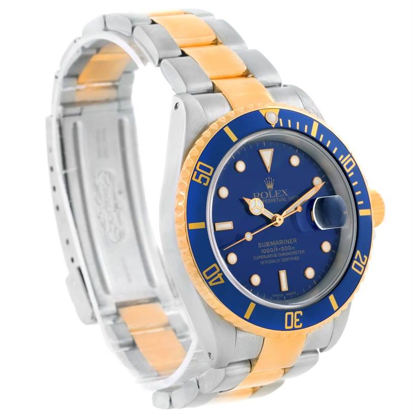 The image shows a side-angle view of a Rolex Submariner 16613 Men's Steel and Gold (two tone) Blue Dial 16613 Men's Steel and Gold (two tone) Blue Dial watch, highlighting the band, bezel, and face.