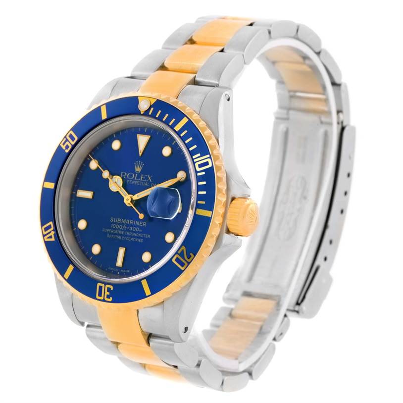 This Rolex Submariner 16613 Men's Steel and Gold (two tone) Blue Dial 16613 Men's Steel and Gold (two tone) Blue Dial watch is shown at an angled side view showcasing the dial, bezel, crown, and bracelet.