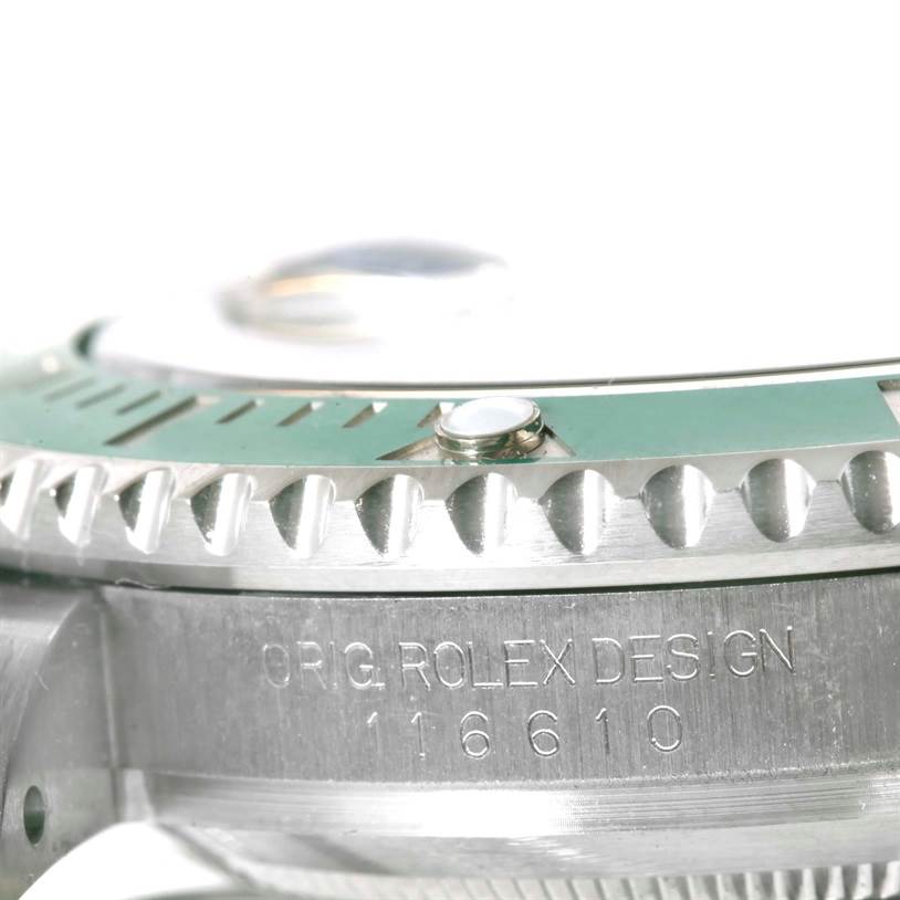 Close-up side view of a Rolex Submariner 116610LV Men
s Stainless Steel Green Dial 116610LV Men
s Stainless Steel Green Dial watch, showing the engraved model number and part of the bezel.