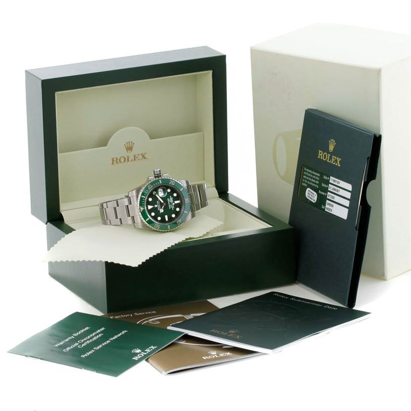 The Rolex Submariner 116610LV Men
s Stainless Steel Green Dial 116610LV Men
s Stainless Steel Green Dial watch is displayed in its open box along with accompanying booklets and papers.