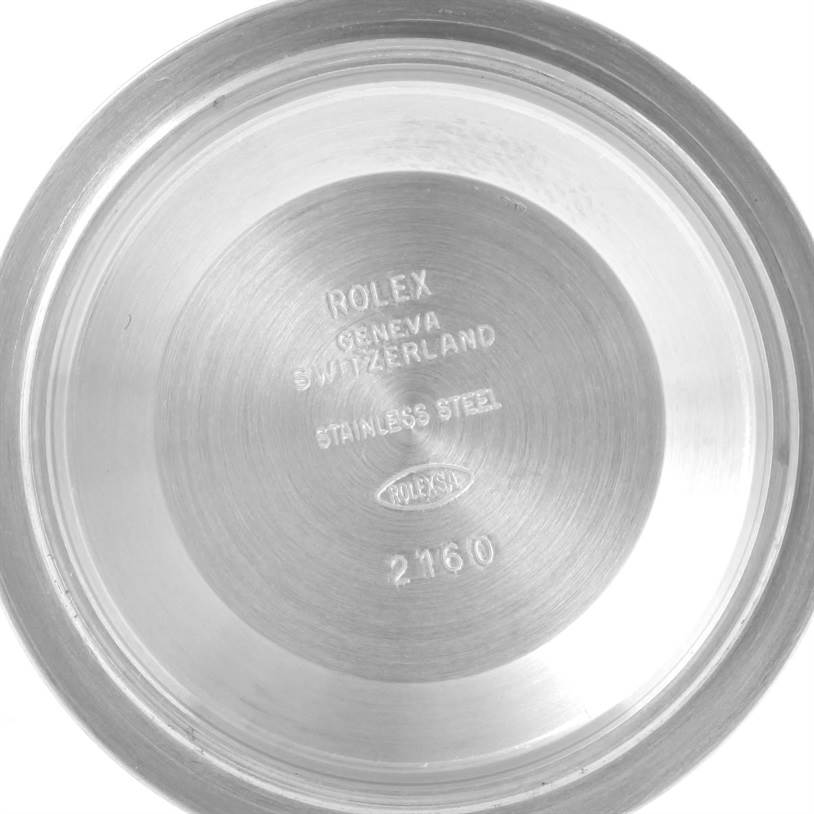 This image shows the interior case back of a Rolex Submariner 14060 Men
s Stainless Steel Black Dial 14060 Men
s Stainless Steel Black Dial watch, engraved with model details.