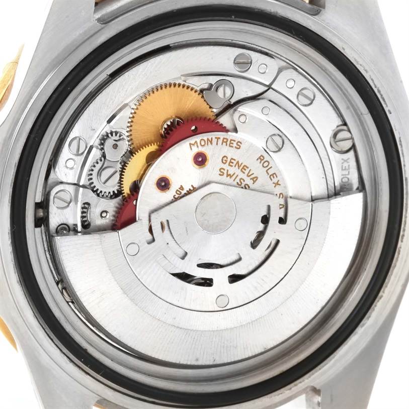 This image shows the internal mechanical movement of a Rolex Submariner 16613 Men's Steel and Gold (two tone) Black Dial 16613 Men's Steel and Gold (two tone) Black Dial watch from the back.