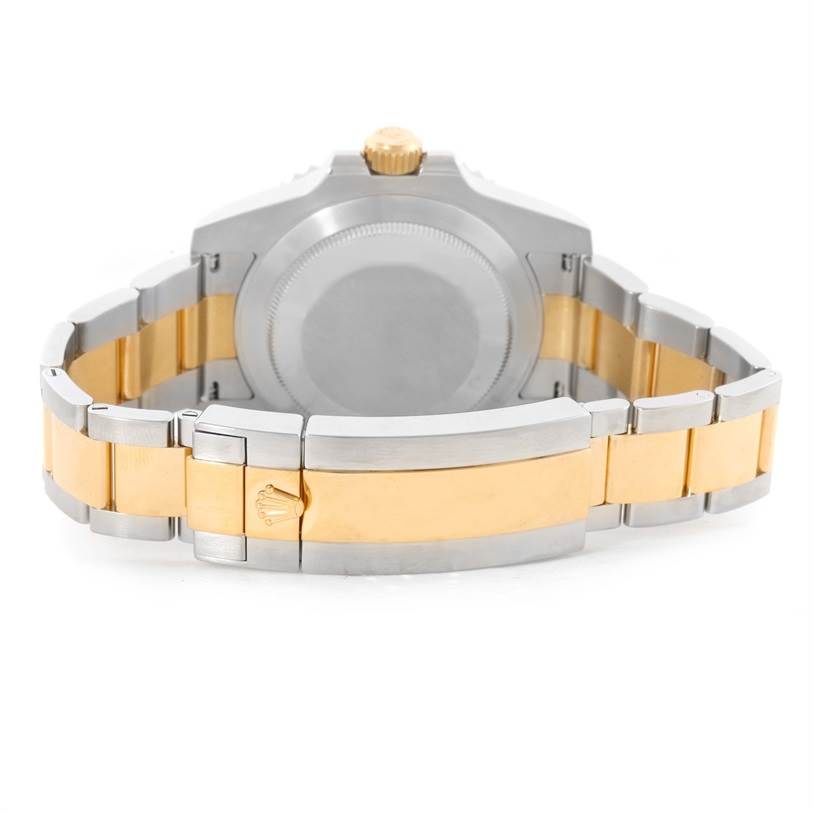 The image shows the back and bracelet of a Rolex Submariner 116613 Men's Steel and Gold (two tone) Blue Dial 116613 Men's Steel and Gold (two tone) Blue Dial watch in a combination of silver and gold tones.