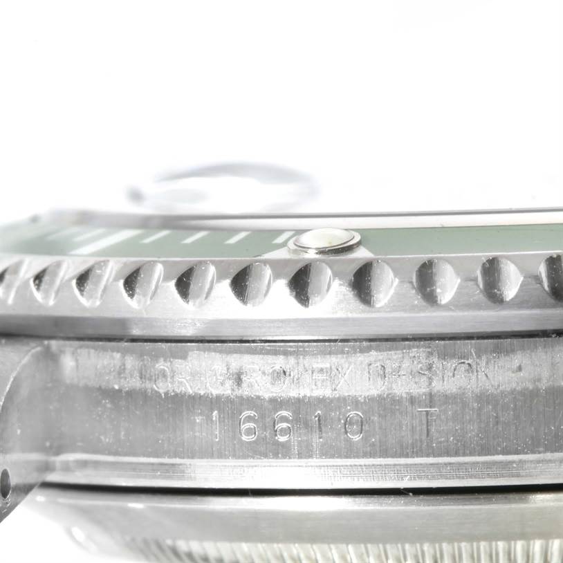 This image shows the side angle of the watch case and bezel of a Rolex Submariner 16610LV Men
s Stainless Steel Black Dial 16610LV Men
s Stainless Steel Black Dial, highlighting the model number inscription.