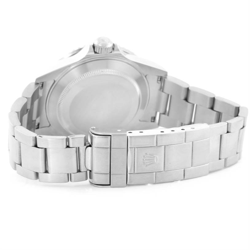 The image shows the back case and bracelet clasp of a Rolex Submariner 16610 Men
s Stainless Steel Black Dial 16610 Men
s Stainless Steel Black Dial watch from an angled rear view.