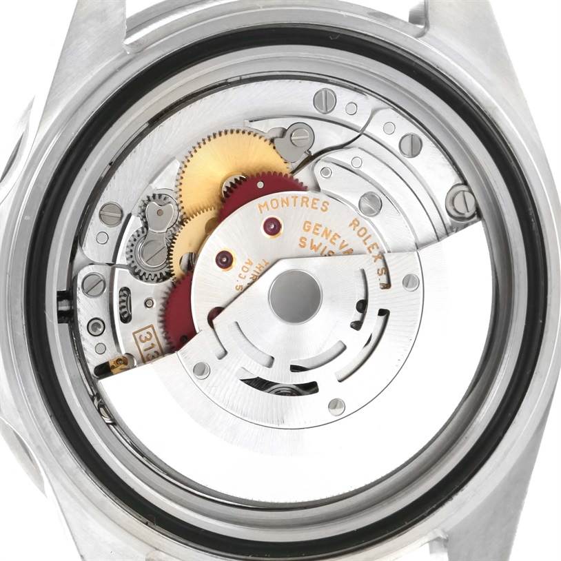 The image shows the inner mechanism and movement of a Rolex Submariner 16610 Men's Stainless Steel Black Dial 16610 Men's Stainless Steel Black Dial watch, viewed from the back.