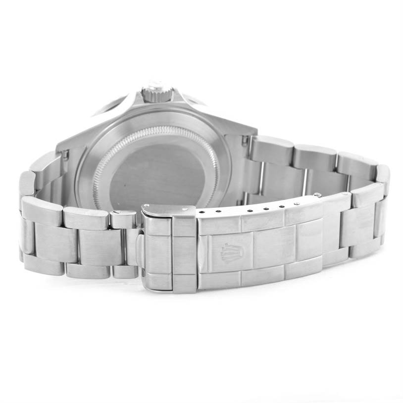 The image shows the back case and bracelet of a Rolex Submariner 16610 Men
s Stainless Steel Black Dial 16610 Men
s Stainless Steel Black Dial watch from a rear angle.