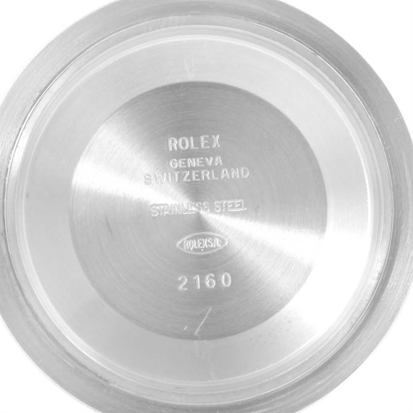 This image shows the stainless steel case back of a Rolex Submariner 16610 Men
s Stainless Steel Black Dial 16610 Men
s Stainless Steel Black Dial, displaying its engravings and model information.